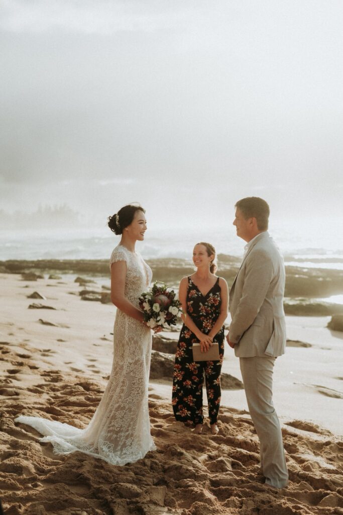 Hawaii Wedding Planning couple gets married on a beach