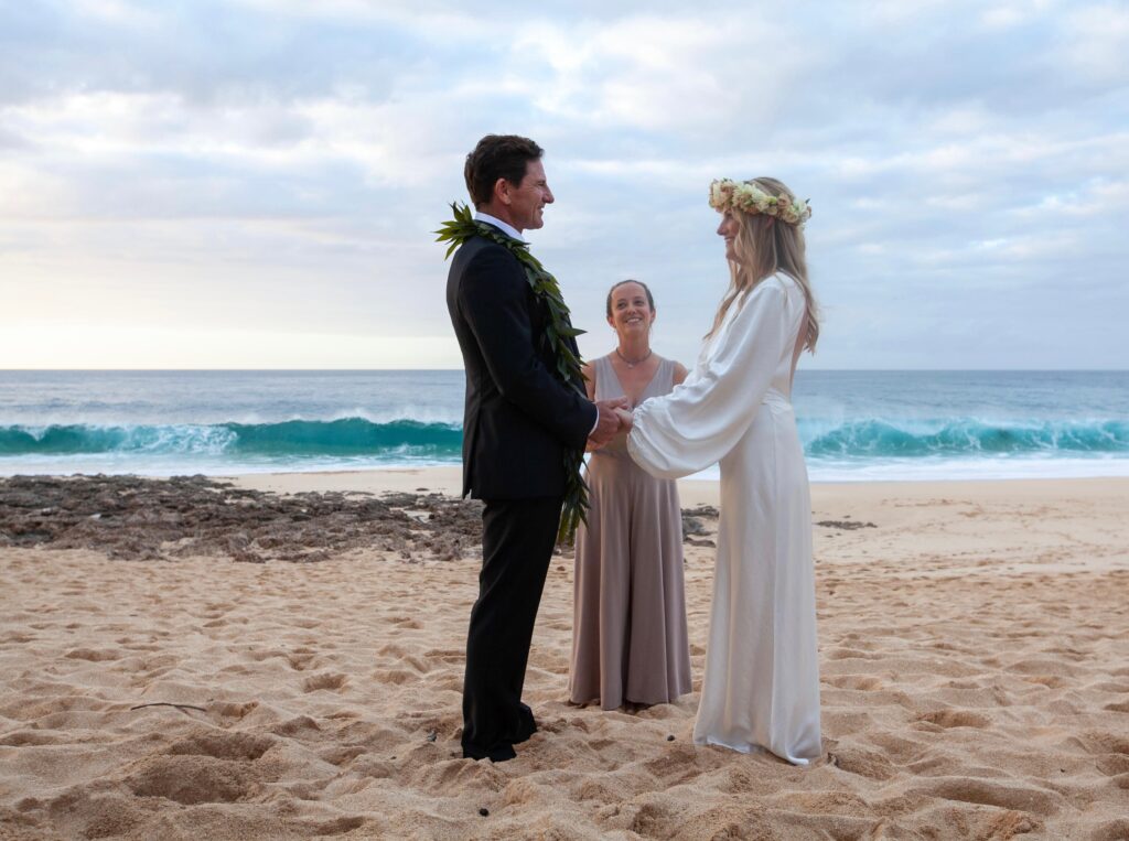 Couple on the beach having a wedding on the North Shore of Oahu.
