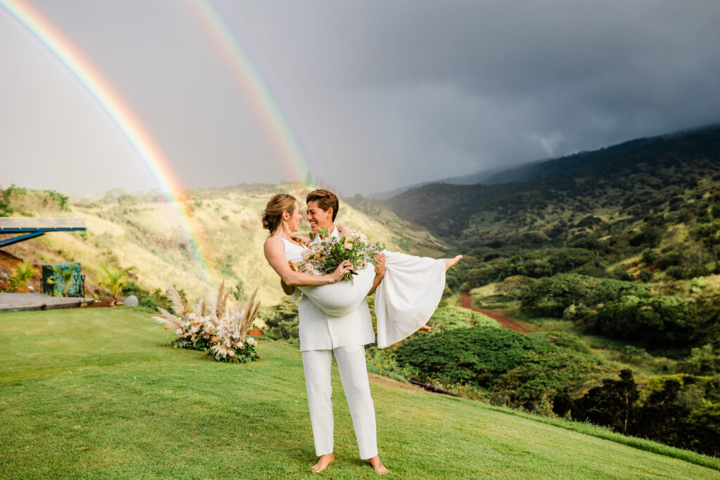 LGBTQ couple gets married under two rainbows at Kaala Vista on the North Shore of Oahu